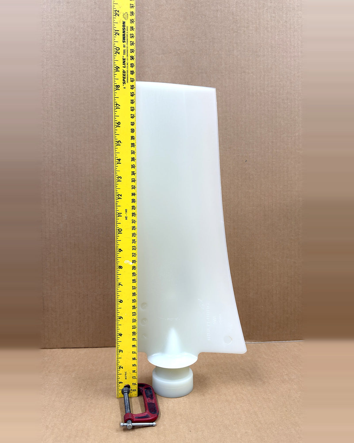 Multiwing 5WL fan blade next to a tape measure for length