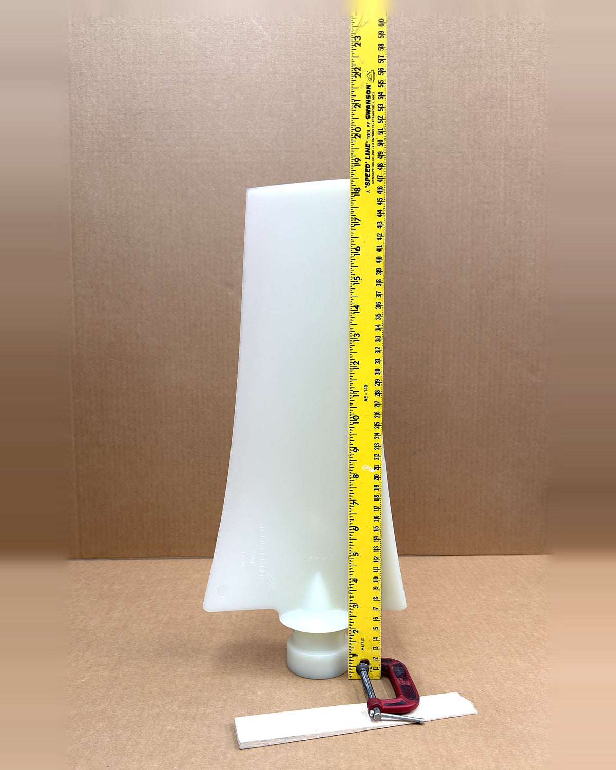 Multiwing 5WR fan blade, uncut, with tape measure showing length