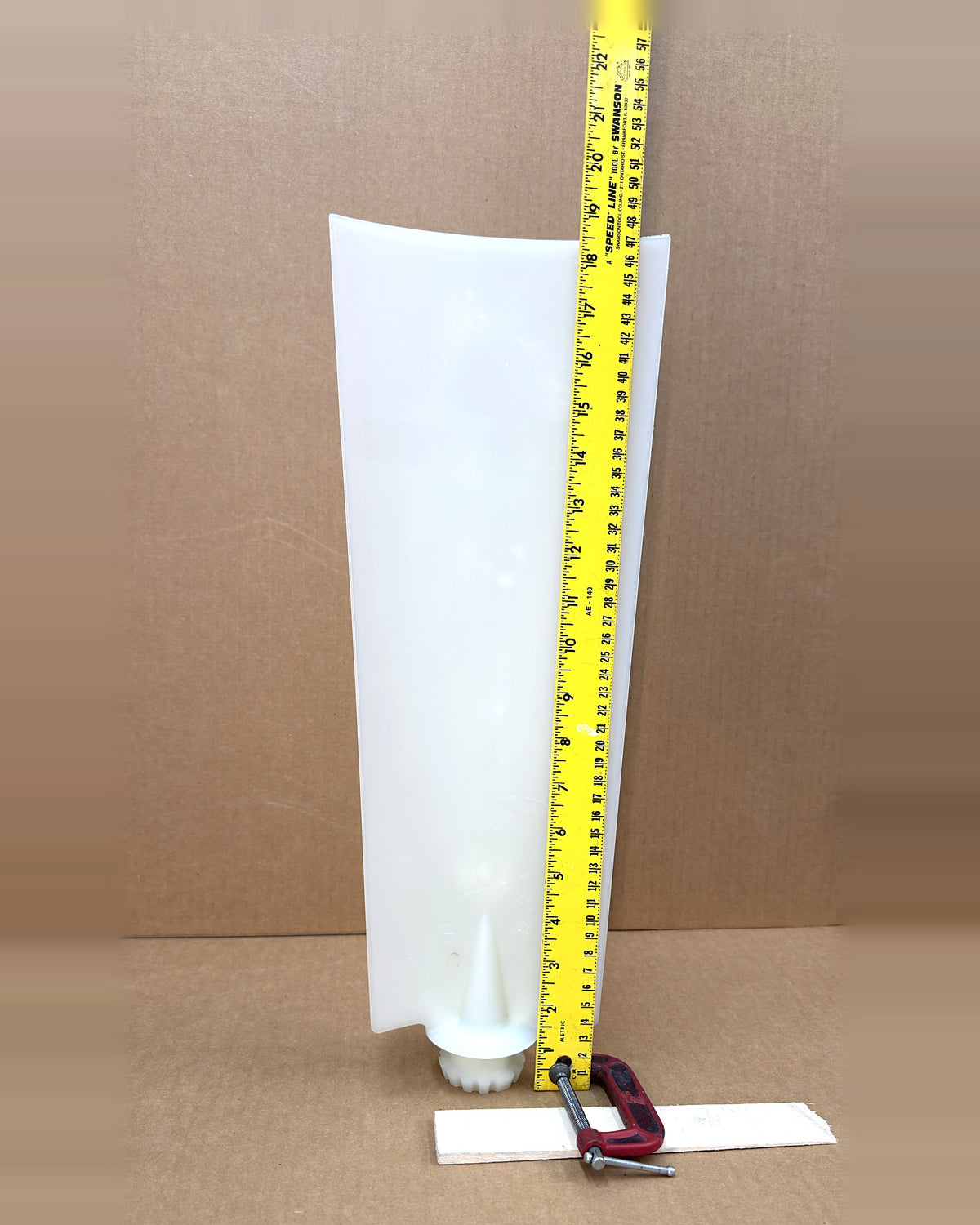 Multiwing 6Z reversible fan blade, uncut, with tape measure showing length
