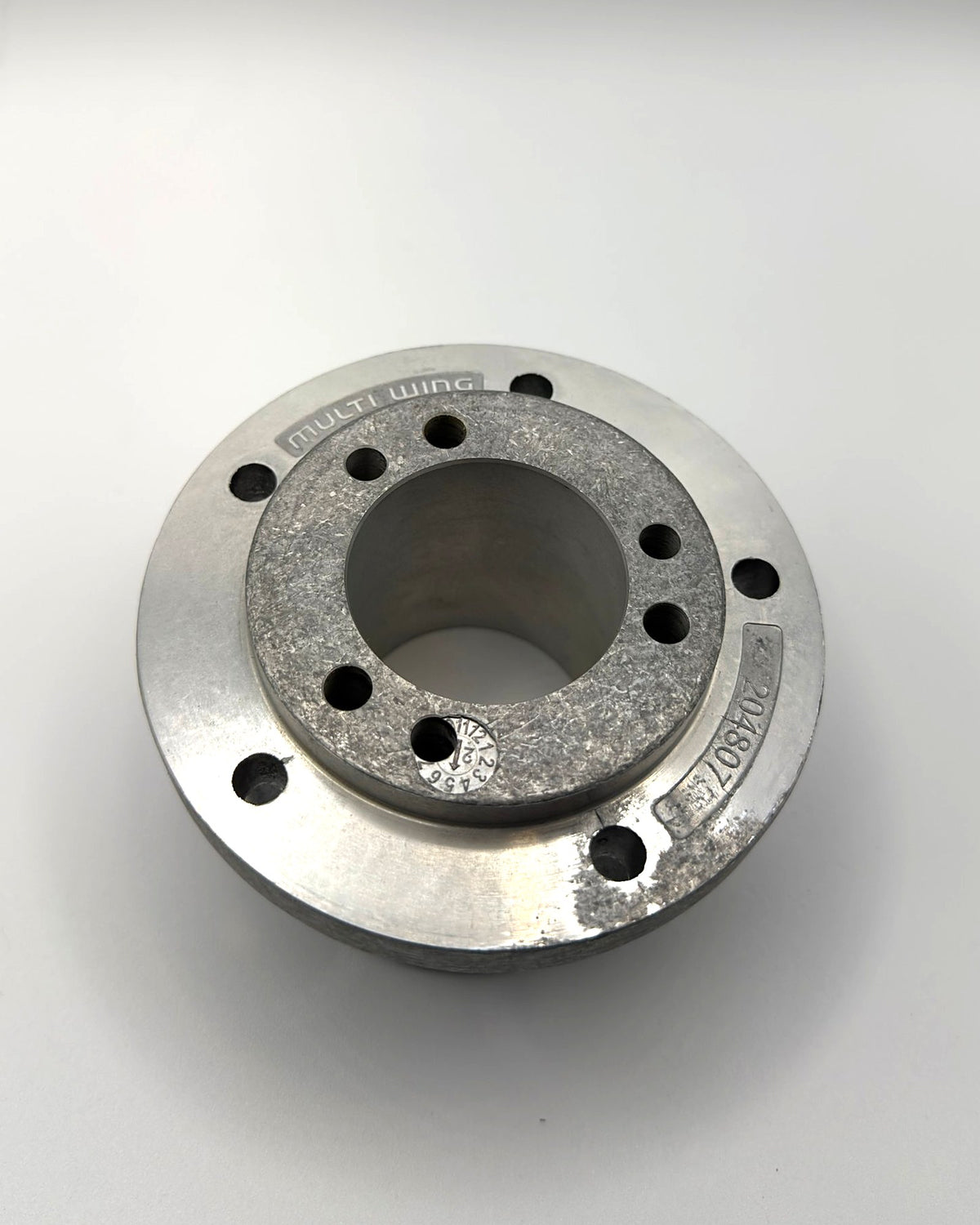 Multiwing SH center boss, 62 mm extended pull-through (reverse mount), flange face with Multiwing stamp